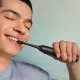 Електрическа четка за зъби Next-Generation Philips Sonicare Серия 3100, черна с калъф за пътуване